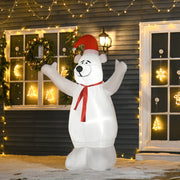 Inflatable bear in front of a house with a wreath and window Christmas lights