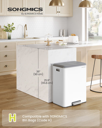 White dual pedal bin beside a kitchen island with its 65.8 cm height marked