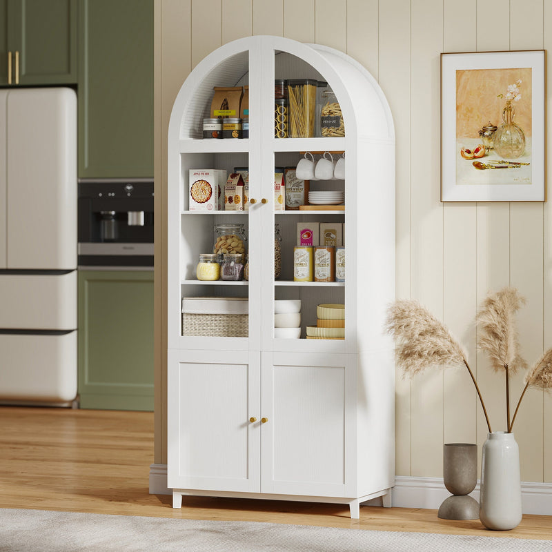 Pantry cabinet in a kitchen with cups, tins and baskets on its shelves