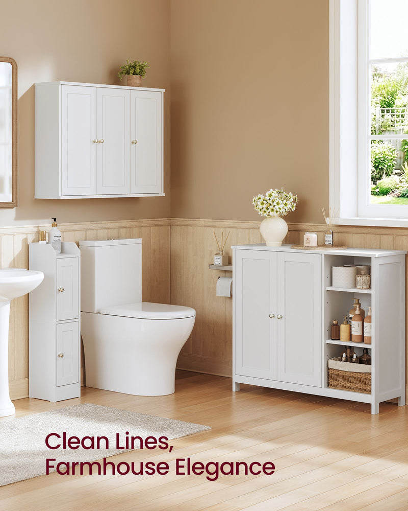 White floor cabinet in a bathroom beside a toilet, wall cabinet and slim storage unit