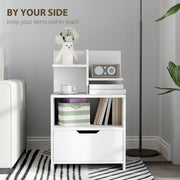 White bedside table in a living room with a vase, radio and books on the top shelves