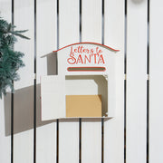 White Christmas postbox with the front door open showing a letter inside