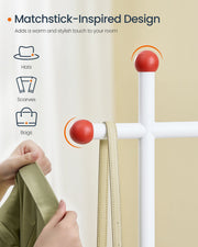 White clothes rail on wheels in a bedroom setting