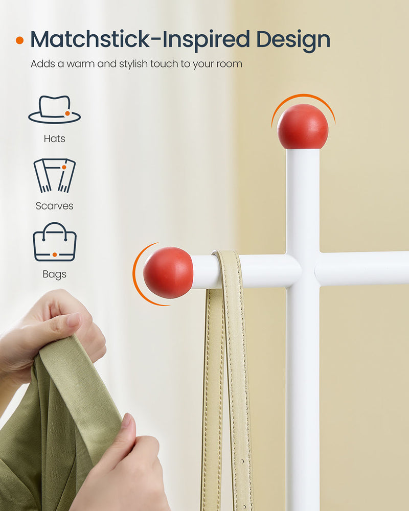 White clothes rail on wheels in a bedroom setting