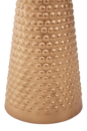 Close-up of the smooth white tabletop where it meets the gold pedestal