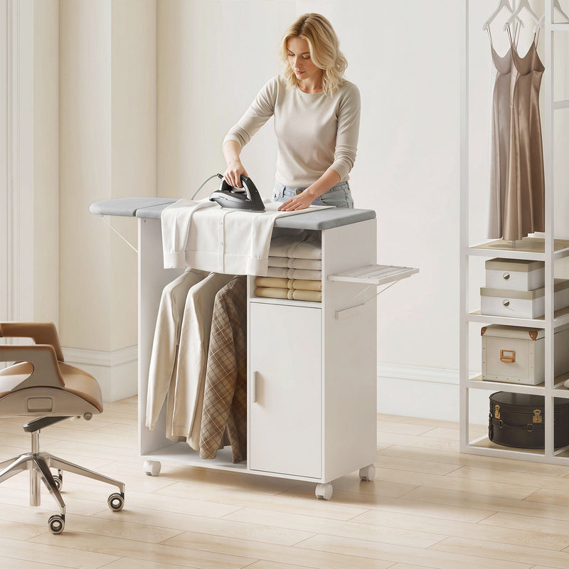 Woman ironing a shirt on the cabinet top with hanging clothes and storage below