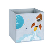 Close-up of a fabric storage drawer with a rocket print pulled out from the unit