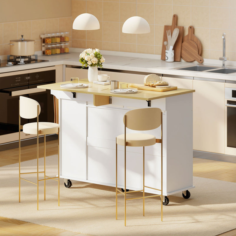 Kitchen island with drop leaf extended in a kitchen beside two bar stools