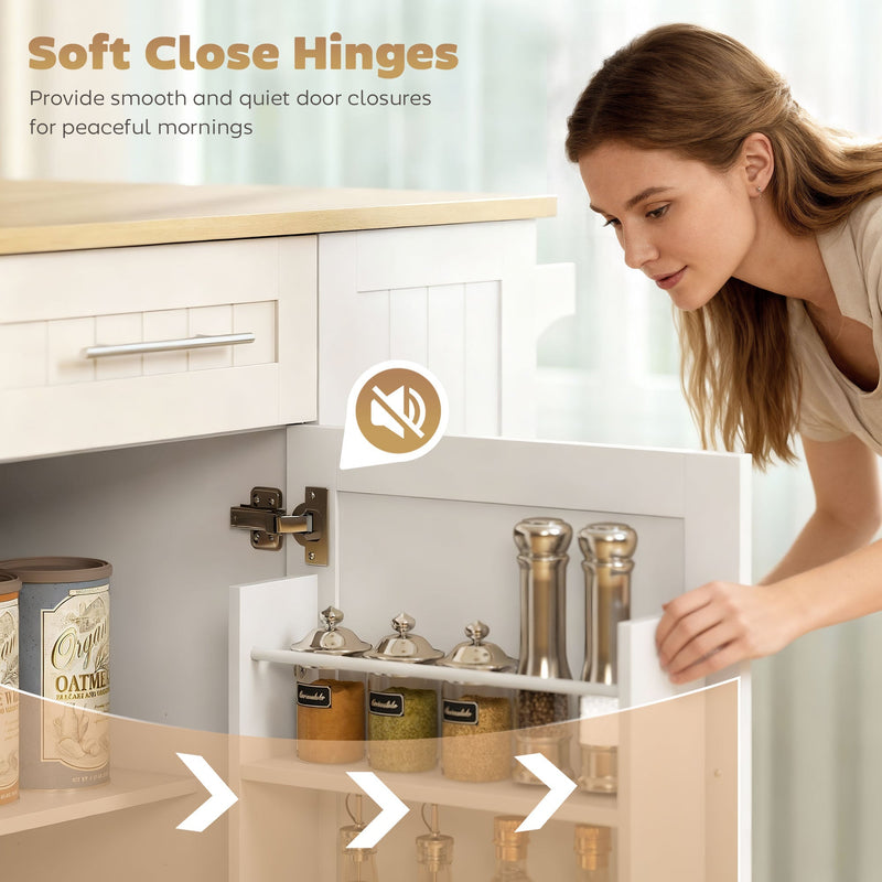 Woman closing a soft-close kitchen island door over a shelf of spice jars