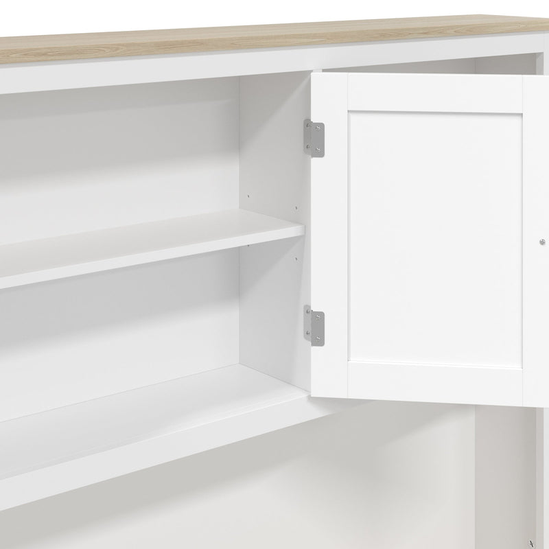 Close-up of an open cupboard door with a shelf and silver hinge
