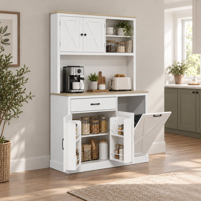 White pantry cabinet in a kitchen with a coffee machine and jars on the worktop