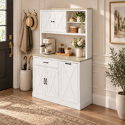 White pantry cabinet in an entrance area beside coat hooks and an umbrella stand