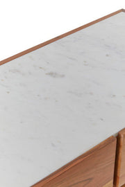 Close-up detail of the acacia wood grain and drawer handle