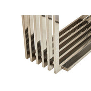 Close-up of the join between the geometric steel frame and the marble effect top