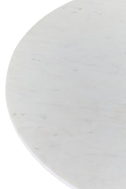 Close-up of the white marble surface showing its natural grey veining