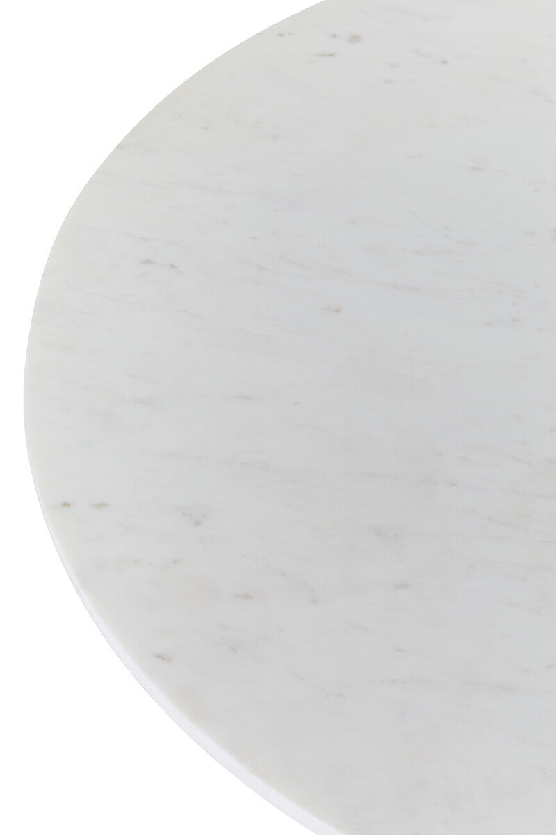 Close-up of the white marble surface showing its natural grey veining