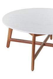Close-up detail of a solid acacia wood leg where it meets the marble top