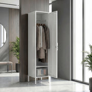 Open white locker with hanging coats and a lower compartment in a hallway