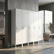 Row of five white lockers in a modern industrial space
