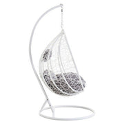 Front view of the white rattan effect hanging chair on a plain background