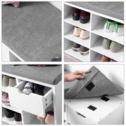 Close up of the grey woven seat fabric beside shoes stored in the open white cubbies