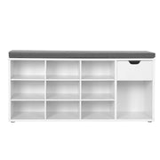 Front view of the empty bench showing three rows of three cubbies, a drawer and a tall boot compartment