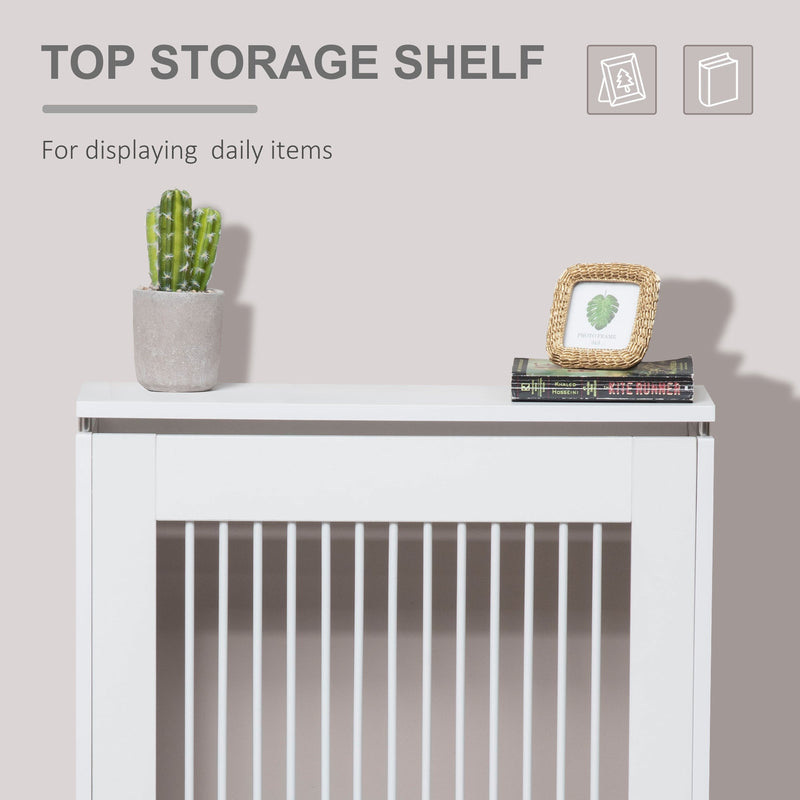 Top shelf of the radiator cover displaying a cactus, photo frame and books