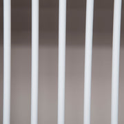 Close-up of the white vertical slats on the radiator cover front