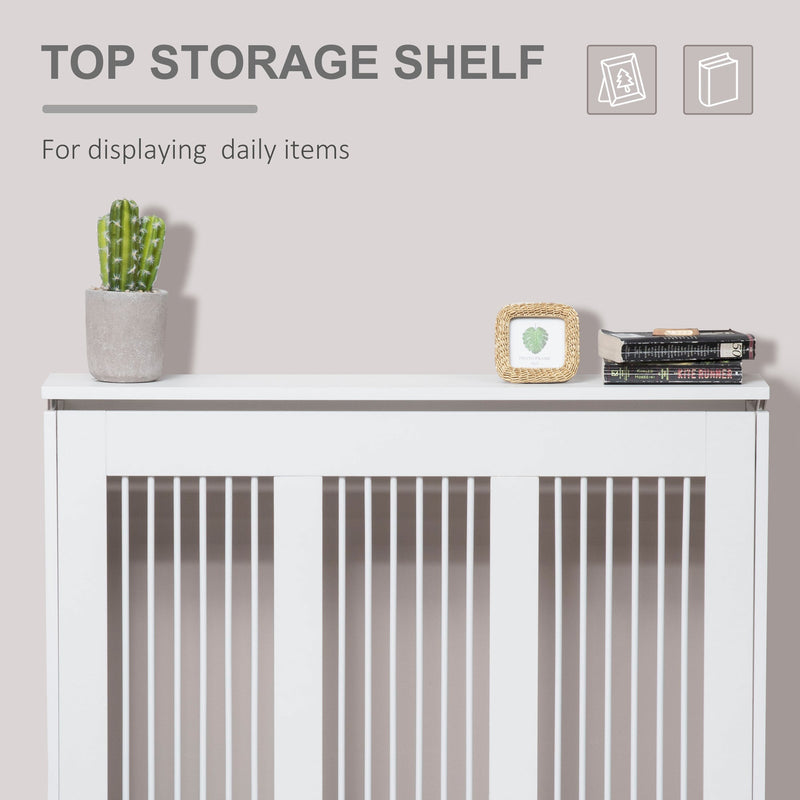 Top shelf of the radiator cover displaying a cactus, photo frame and books