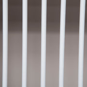 Close-up of the white vertical slats on the radiator cover front