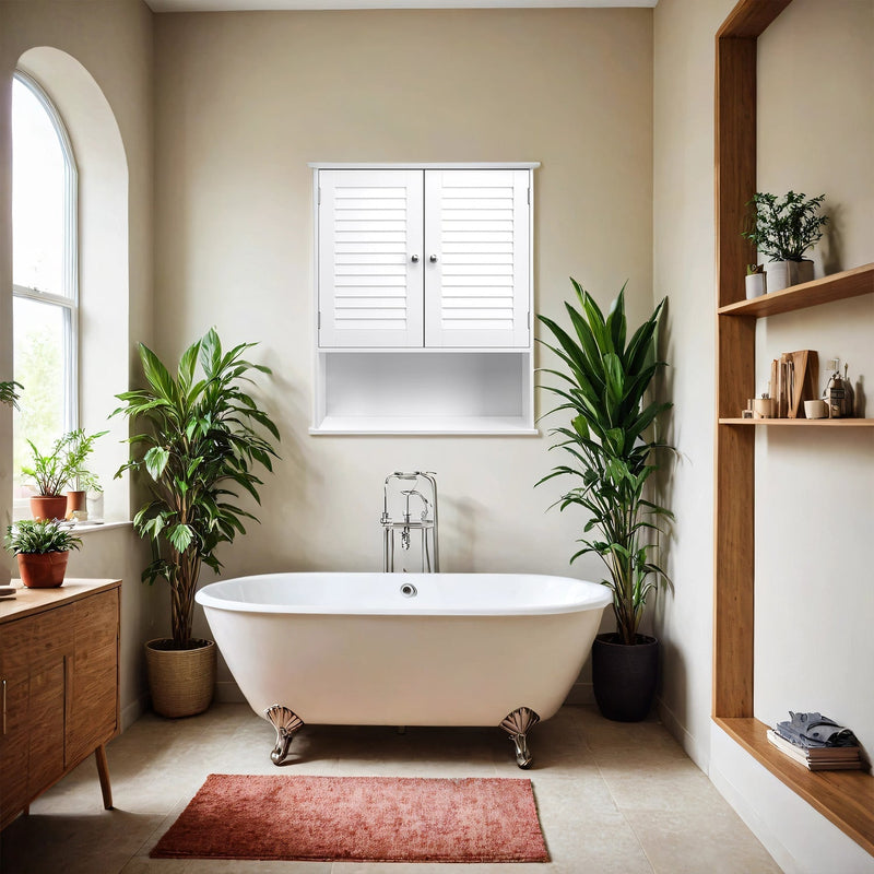 White wall mounted bathroom cabinet with louvred doors above a bathtub window