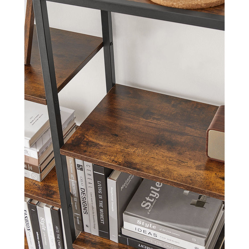 Close-up of a shelf surface above a row of design books on the tier below