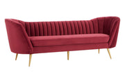 Wine velvet 3 seater sofa with channel tufting and gold legs, plain background