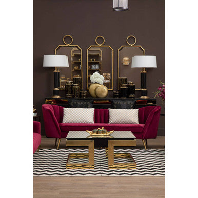 Wine velvet 3 seater sofa shown as a living room centrepiece