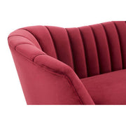 Close-up of the channel-tufted wine velvet upholstery