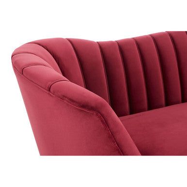 Close-up of the channel-tufted wine velvet upholstery