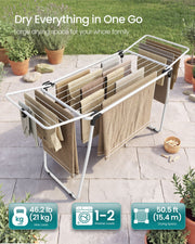 Winged airer on a patio loaded with towels, with 21 kg load, 1-2 washer loads and 15.4 m drying space labels