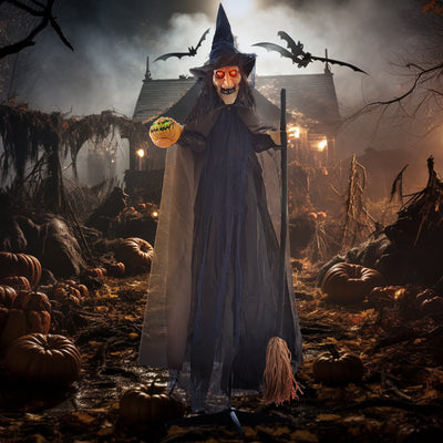 Homcom witch with broomstick animatronic in a moonlit haunted house lifestyle scene