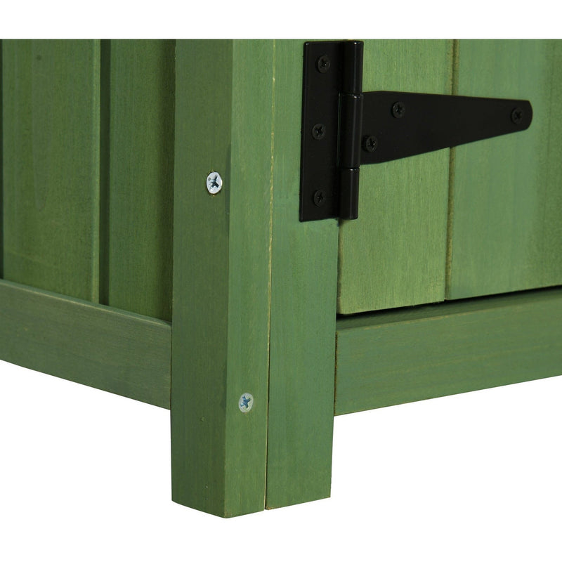 Close-up of the green shed corner joint, black T-hinge and raised foot