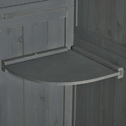 Close-up of a removable quarter-round shelf inside the grey shed