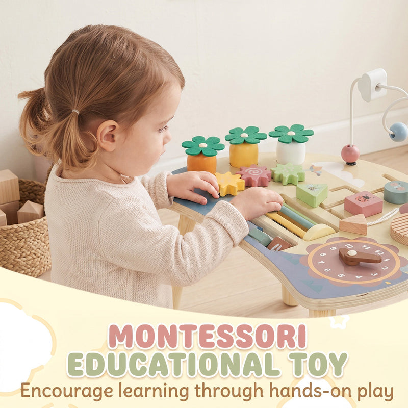 Toddler playing with the flower pieces and beads on the Montessori activity table