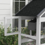 Close-up of an open side door and the internal birdhouse compartment