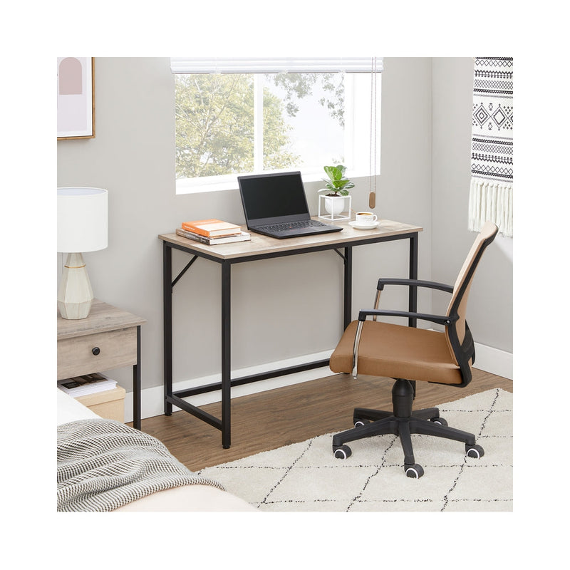 Wooden computer desk with storage shelf by Vasagle, bottom shelf detail view