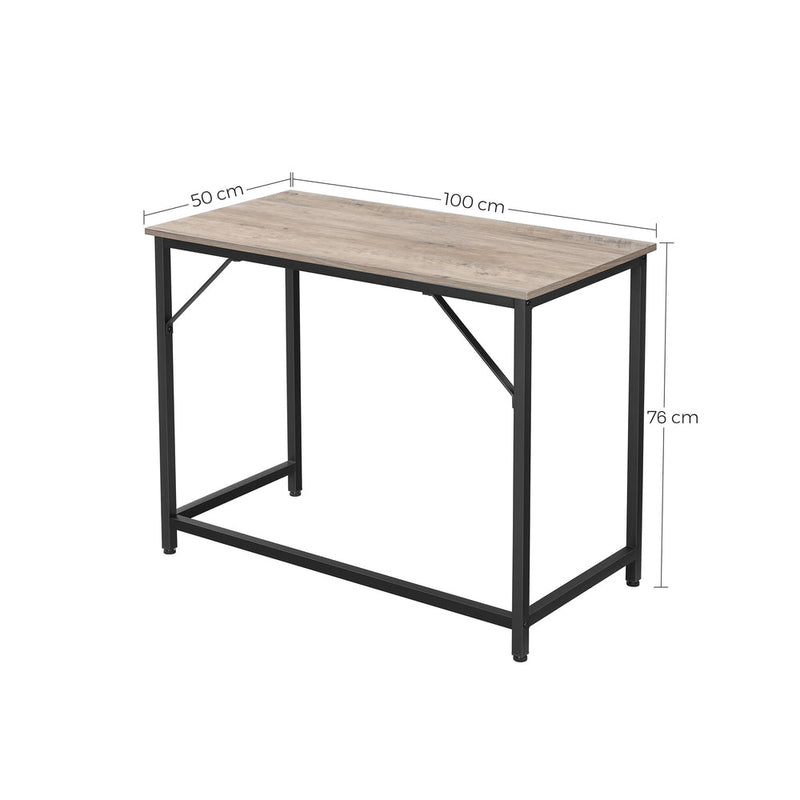 Wooden computer desk with storage shelf by Vasagle, styled in a bedroom setting