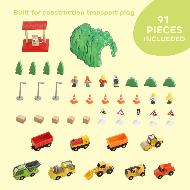 All 91 pieces laid out including gas station, tunnel, trees, workers, barriers and vehicles