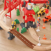 Close-up of the red crane, brown ramp track and construction vehicles on the layout