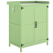 Light green wooden garden tool shed with stainless steel worktop and closed double doors