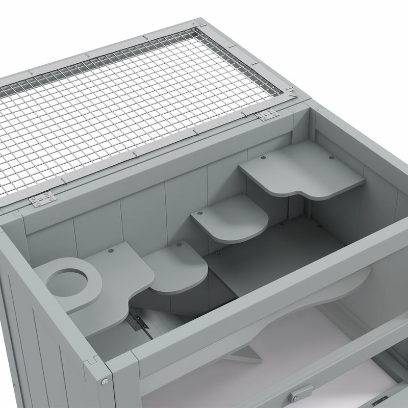 Overhead close-up of the cage interior showing platforms and mesh roof
