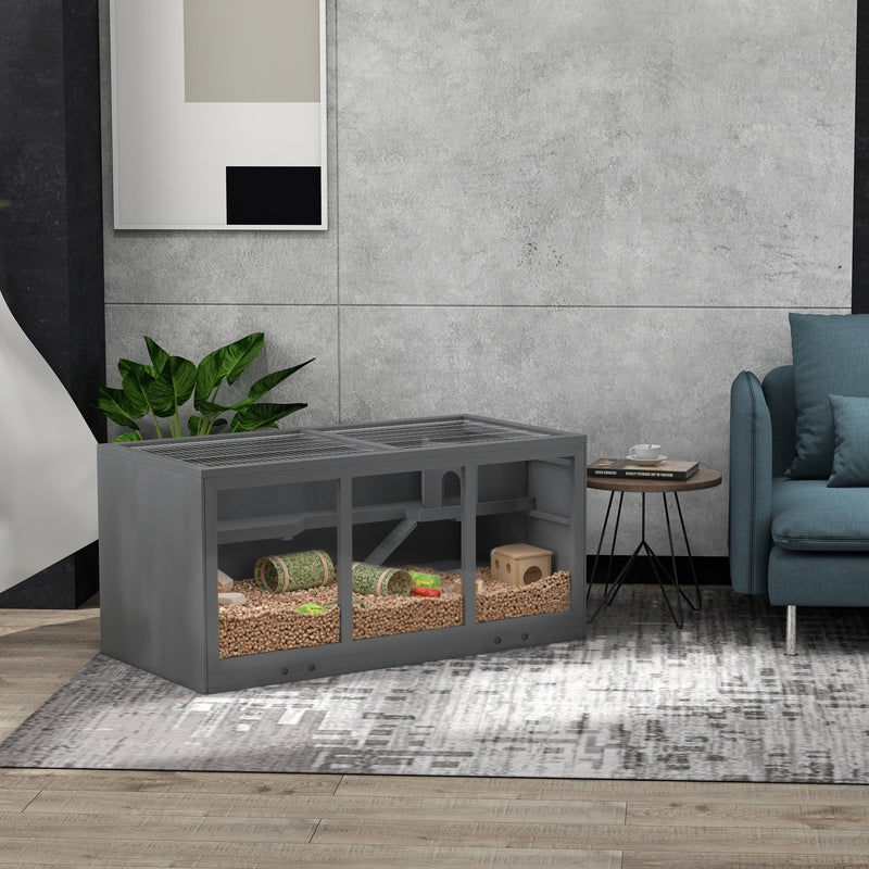 Grey PawHut hamster cage furnished with bedding and tunnels in a living room setting