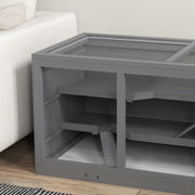 Close-up of the hamster cage's mesh top and wooden frame in a room setting